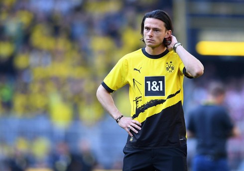 "Borussiya" məişət zorakılığında ittiham olunan futbolçunun müqaviləsini ləğv edib